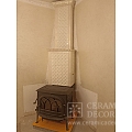 Облицовка дымохода у печи Jotul F 500 изразцами коллекции Альбион.. Артикул: 9629 в интерьере. Галерея работ студии CeramicaDecor. Фото №2